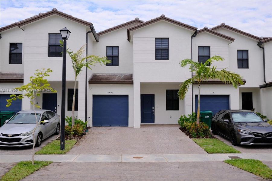 Front exterior of a new home in , Miami, FL, highlighting curb appeal (Image 1).