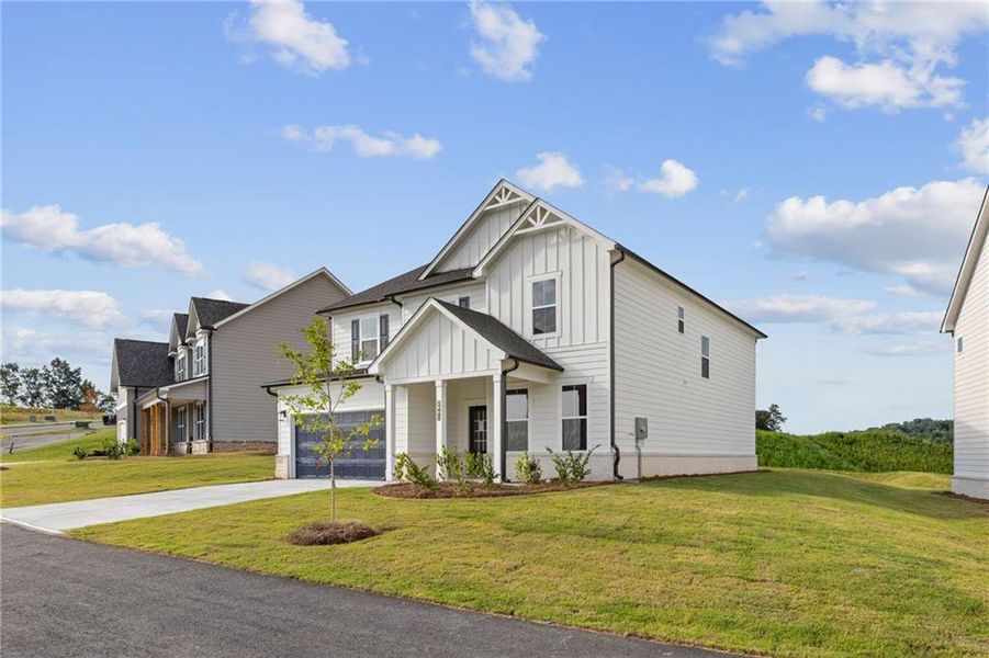 Front exterior of a new home in The Estates at Gainesville Township, Gainesville, GA, highlighting curb appeal (Image 2).