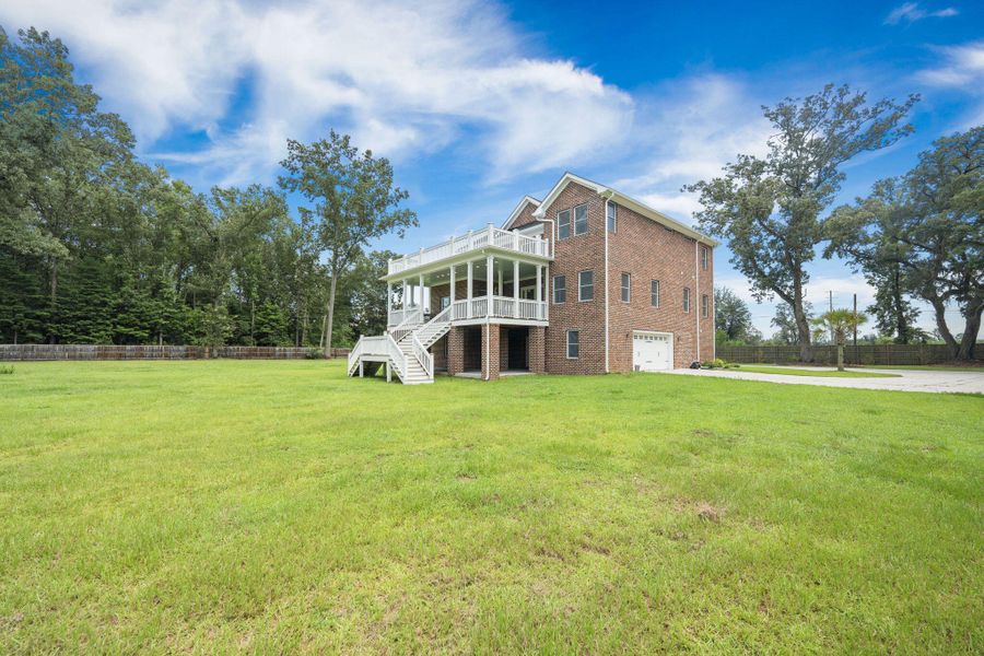 Front exterior of a new home in , Summerville, SC, highlighting curb appeal (Image 34). Front exterior of a new home in , Summerville, SC, highlighting curb appeal (Image 34).
