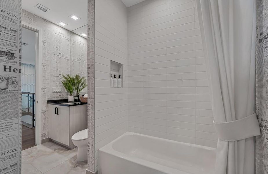 Furnished interior view inside a new home in Apex at Avenir, Palm Beach Gardens (Image 103).