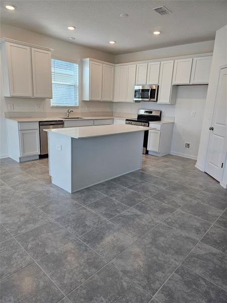Furnished interior view inside a new home in Storey Creek: Estate Collection, Kissimmee (Image 5).