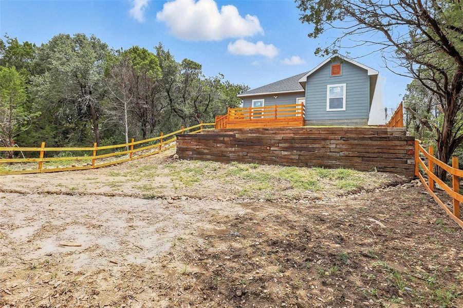Front exterior of a new home in , Granbury, TX, highlighting curb appeal (Image 19). Front exterior of a new home in , Granbury, TX, highlighting curb appeal (Image 19).