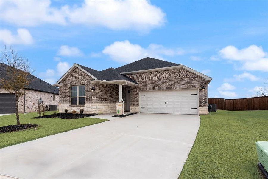 Front exterior of a new home in Walden Pond, Forney, TX, highlighting curb appeal (Image 20).