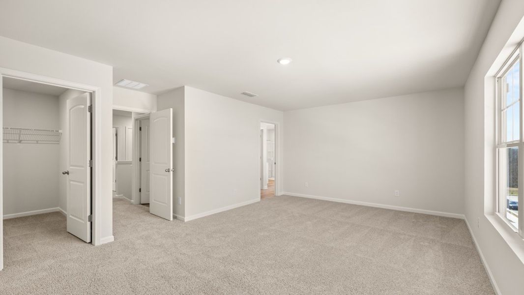 Representative unfurnished interior of a home built from the Flora by D.R. Horton in Sheffield Highlands, Dallas (Image 22).