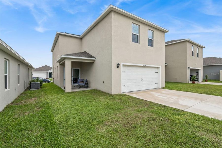 Exterior details and patio area of a home in Windrose, Apopka (Image 21).