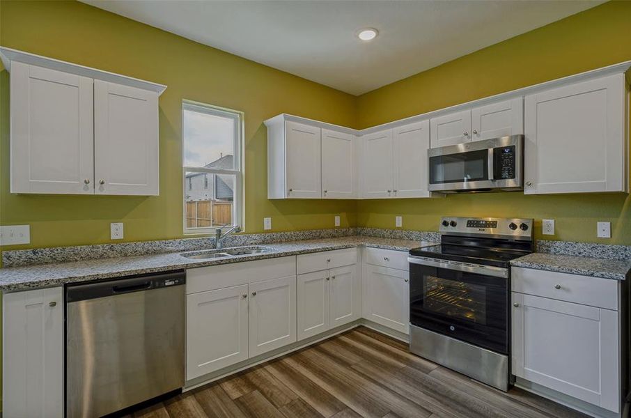 Furnished interior view inside a new home in Creekview Fossil Ridge, Pilot Point (Image 13).