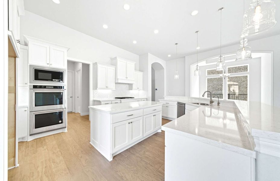 Representative furnished interior of a home built from the 3663 by Ravenna Homes in Artavia 70′, Conroe (Image 13).