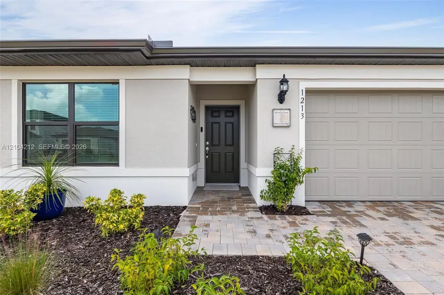 Exterior details and patio area of a home in , Labelle (Image 24).
