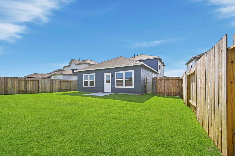 Exterior details and patio area of a home in Barrett Crossing, Crosby (Image 4).