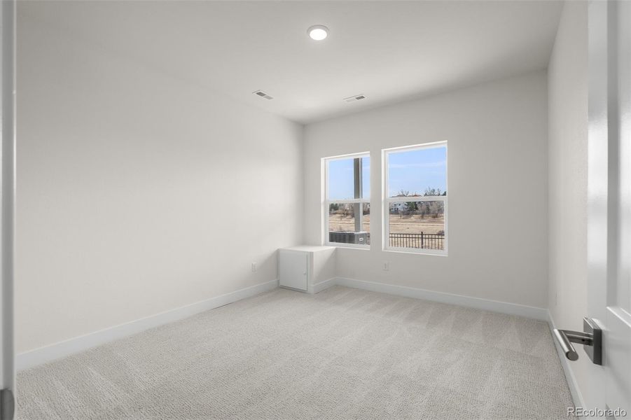 Spacious, unfurnished interior of a new home in Trailside at Cottonwood Creek, Colorado Springs (Image 25).