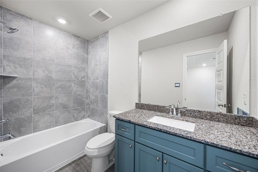 Furnished interior view inside a new home in Hill & Dale Ranch, Splendora (Image 4).