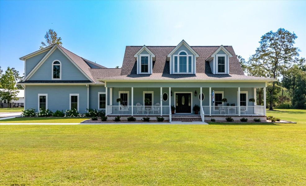 Front exterior of a new home in , Ravenel, SC, highlighting curb appeal (Image 23). Front exterior of a new home in , Ravenel, SC, highlighting curb appeal (Image 23).