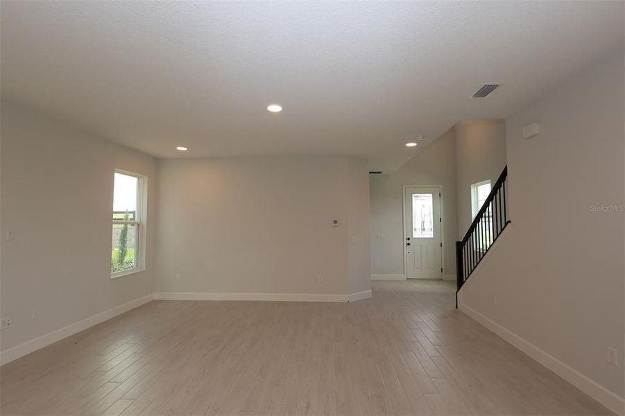 Spacious, unfurnished interior of a new home in Lake Star at Ovation, Winter Garden (Image 21).