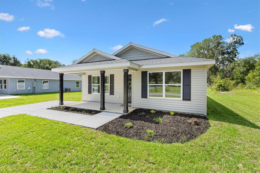 Front exterior of a new home in , Bushnell, FL, highlighting curb appeal (Image 22).