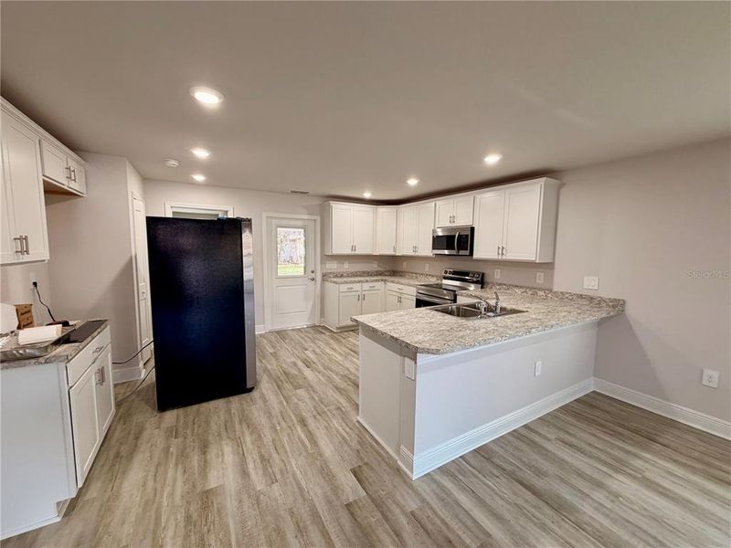 Furnished interior view inside a new home in , Lake Wales (Image 3).