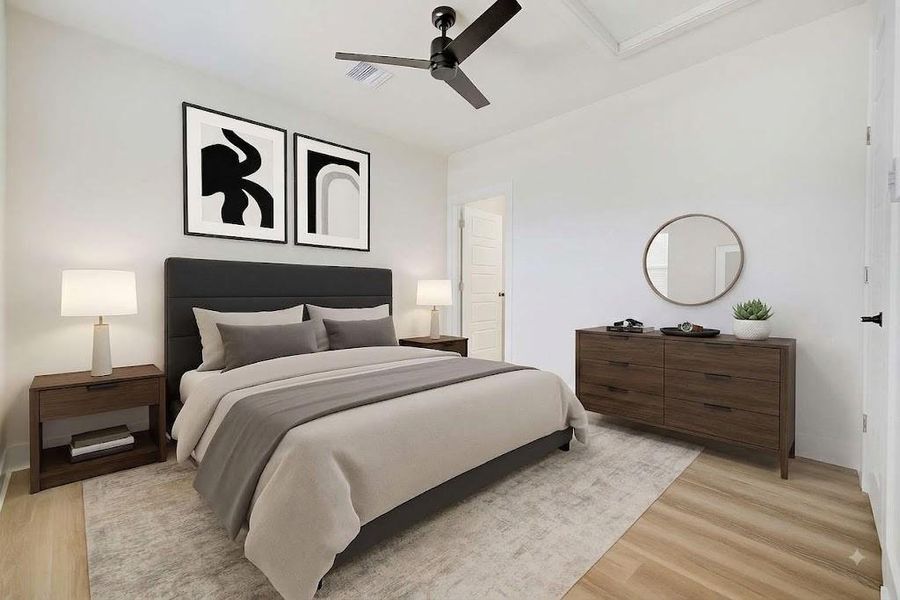 Large third floor bedroom with ceiling fan and simple finishes. Large third floor bedroom with ceiling fan and simple finishes.