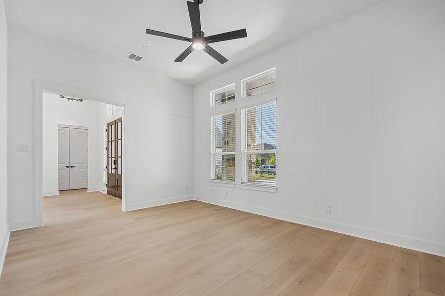 Representative unfurnished interior of a home built from the Raegan by Chesmar Homes in Sweetwater, Austin (Image 15). Representative unfurnished interior of a home built from the Raegan by Chesmar Homes in Sweetwater, Austin (Image 15).