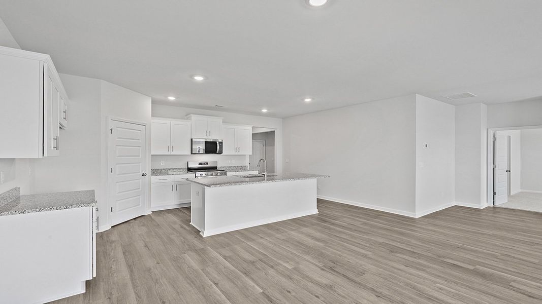 Furnished interior view inside a new home in Highland Hills, Graniteville (Image 6).