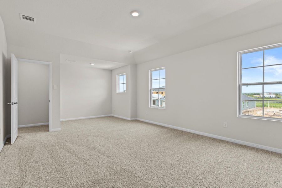 Spacious, unfurnished interior of a new home in Whisper South, San Marcos (Image 28).