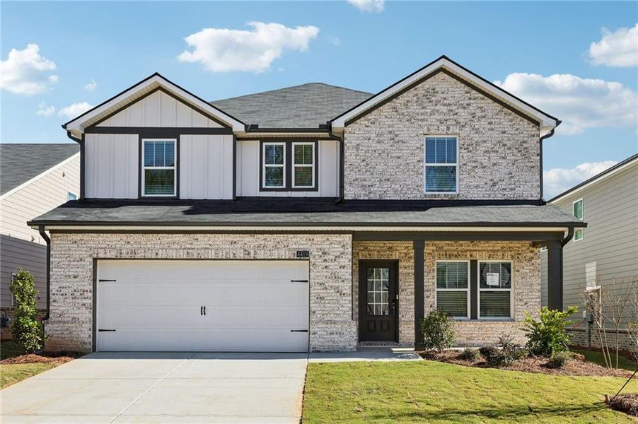Front exterior of a new home in Westmont Preserve, Powder Springs, GA, highlighting curb appeal (Image 2).