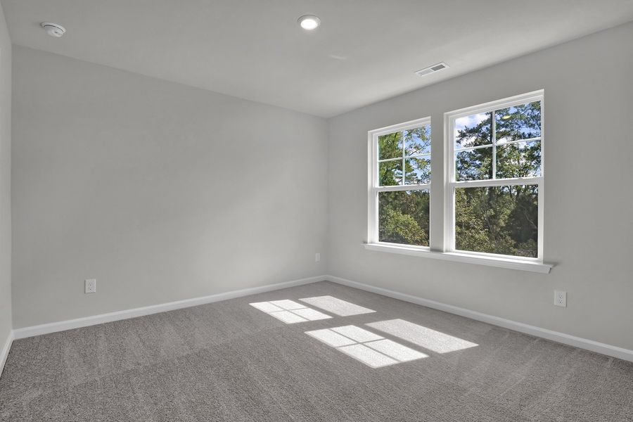 Spacious, unfurnished interior of a new home in Grand Park, Leland (Image 28). Spacious, unfurnished interior of a new home in Grand Park, Leland (Image 28).