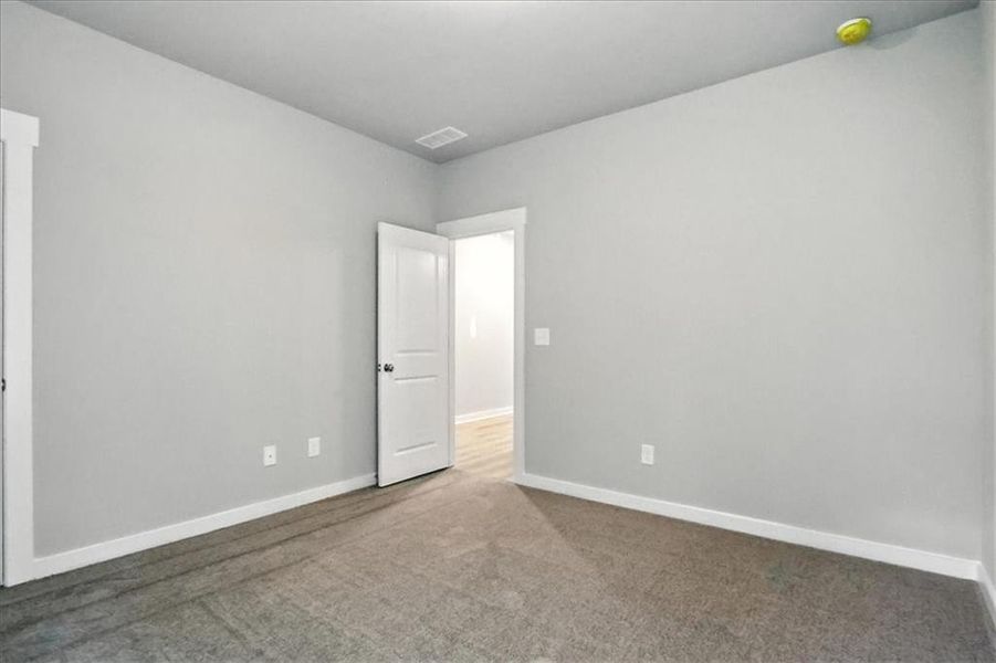 Spacious, unfurnished interior of a new home in Traditions of Braselton, Jefferson (Image 50).