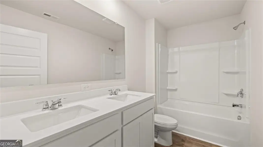 Furnished interior view inside a new home in Twin Lakes, Hoschton (Image 3).