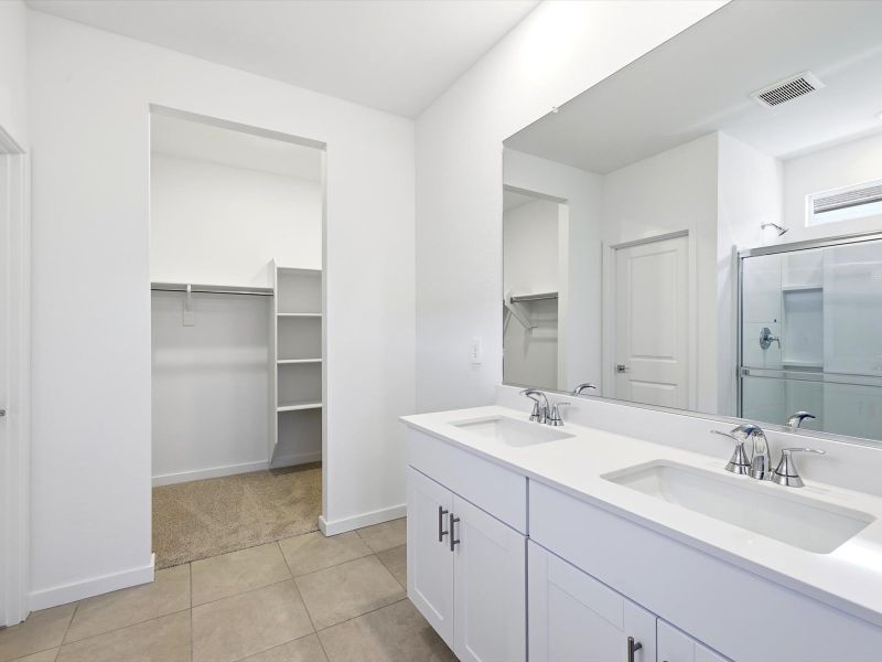 Furnished interior view inside a new home in Silva Farms - Estate Series, Goodyear (Image 5). Furnished interior view inside a new home in Silva Farms - Estate Series, Goodyear (Image 5).