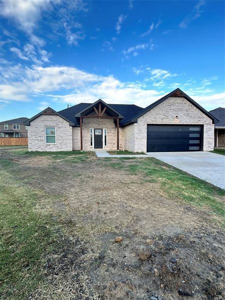 Ranch-style house with a garage