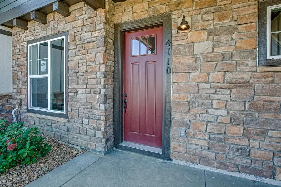 Representative exterior details of a home built from the The Eldorado by Landmark Homes in The Lakes at Centerra, Loveland (Image 3). Representative exterior details of a home built from the The Eldorado by Landmark Homes in The Lakes at Centerra, Loveland (Image 3).