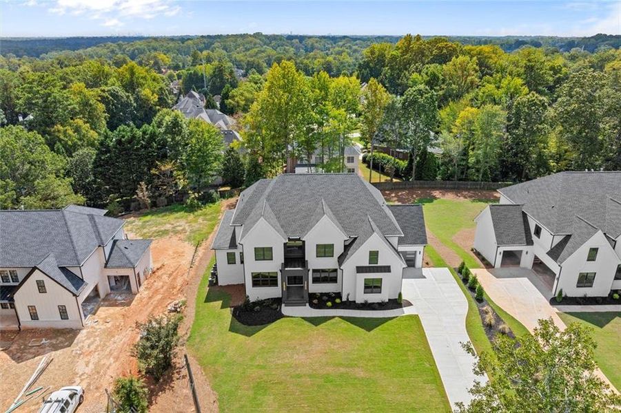 Front exterior of a new home in , Marietta, GA, highlighting curb appeal (Image 26).