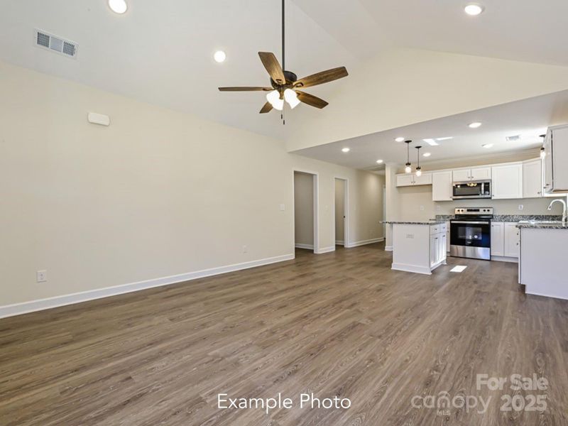 Example Photo Example Photo