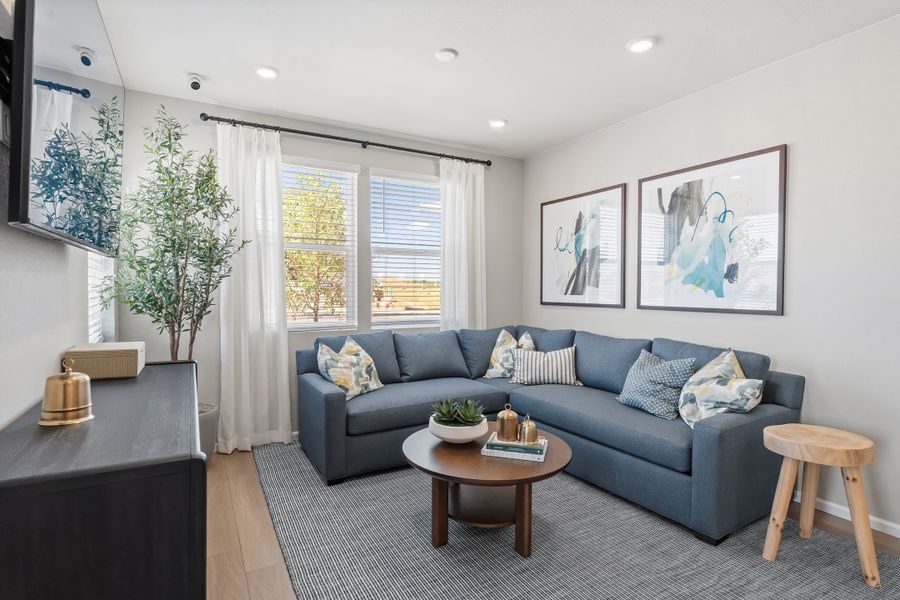 Representative furnished interior of a home built from the 2403 by Risewell Homes in Harvest Crossing, Aurora (Image 4).
