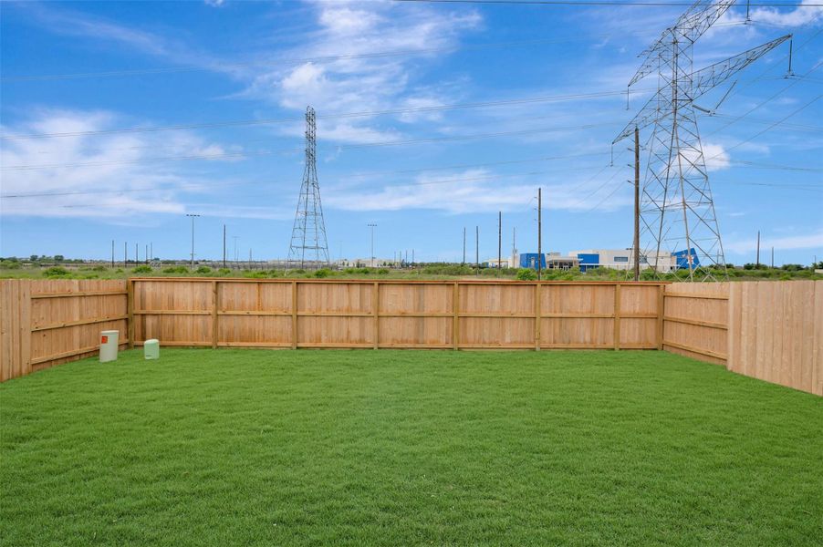 Exterior details and patio area of a home in Elyson - Reserve Collection, Katy (Image 22).