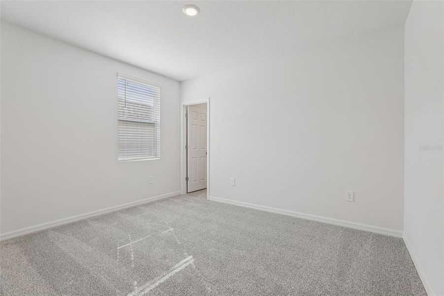 Spacious, unfurnished interior of a new home in Deer Run at Crosswinds, Davenport (Image 35).