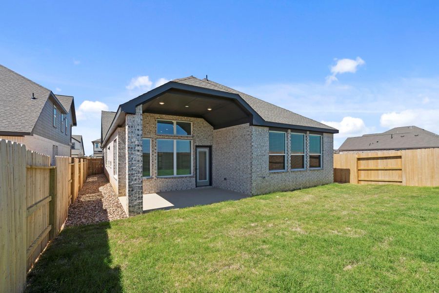 Exterior details and patio area of a home in Wildrye 45', Waller (Image 4).