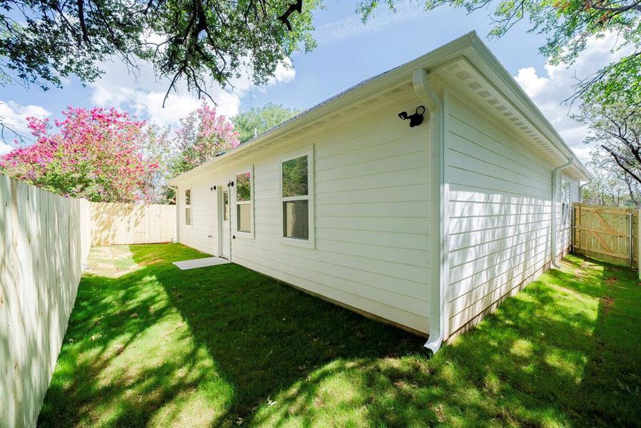 View of home's exterior featuring a lawn