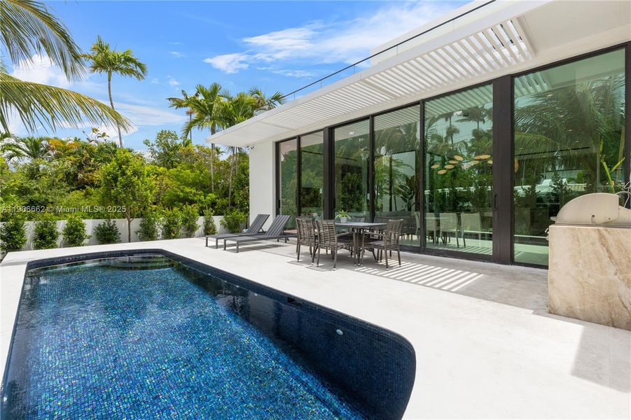 Exterior details and patio area of a home in , Miami Beach (Image 17).