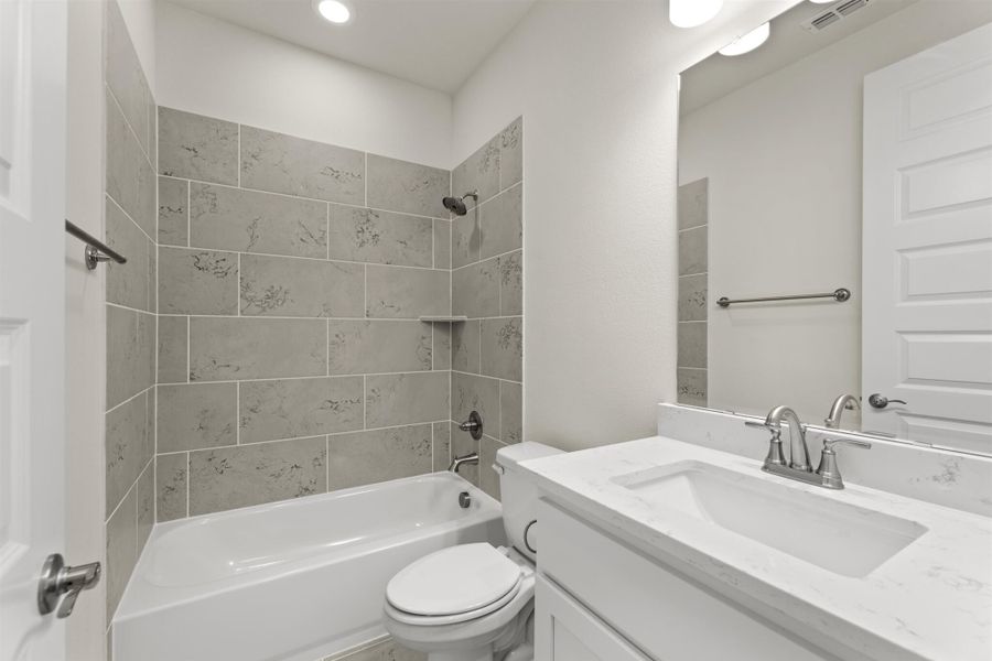 Representative furnished interior of a home built from the Juniper by UnionMain Homes in Edgewater, Fate (Image 6).