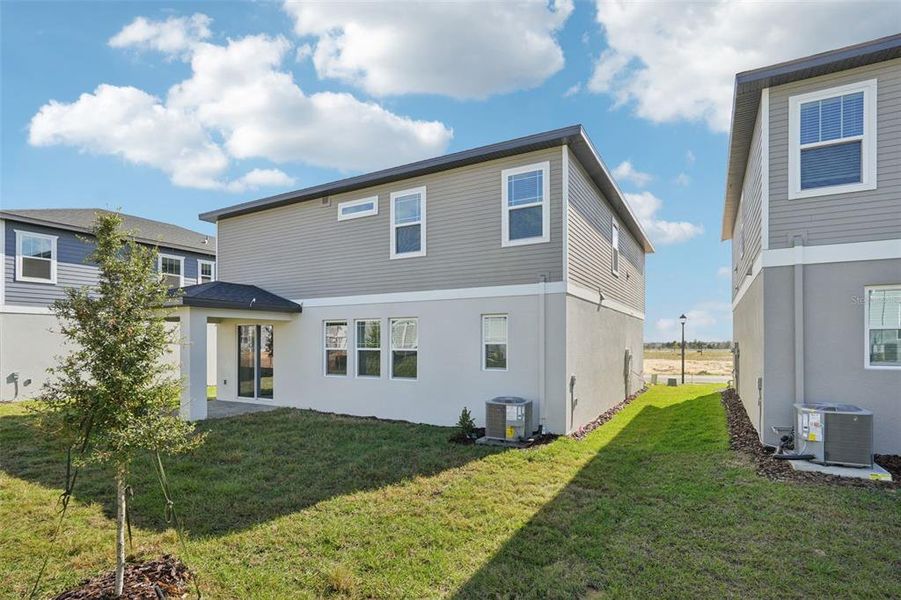 Exterior details and patio area of a home in Cyrene at Minneola, Minneola (Image 19). Exterior details and patio area of a home in Cyrene at Minneola, Minneola (Image 19).