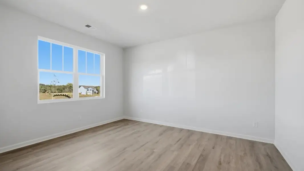 Representative unfurnished interior of a home built from the Green by D.R. Horton in Aurora Creek, Dallas (Image 13).