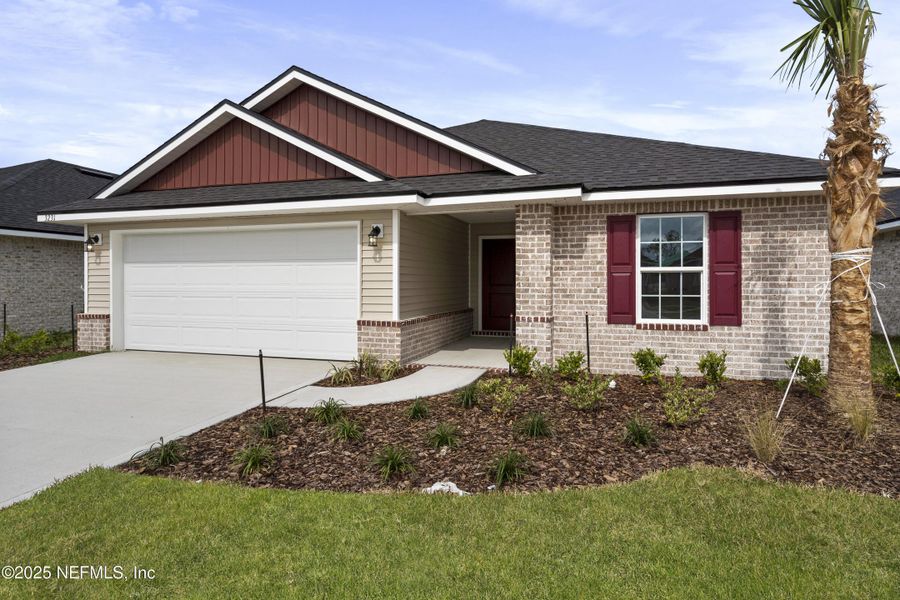 Front exterior of a new home in Shadow Crest at Rolling Hills, Green Cove Springs, FL, highlighting curb appeal (Image 15).