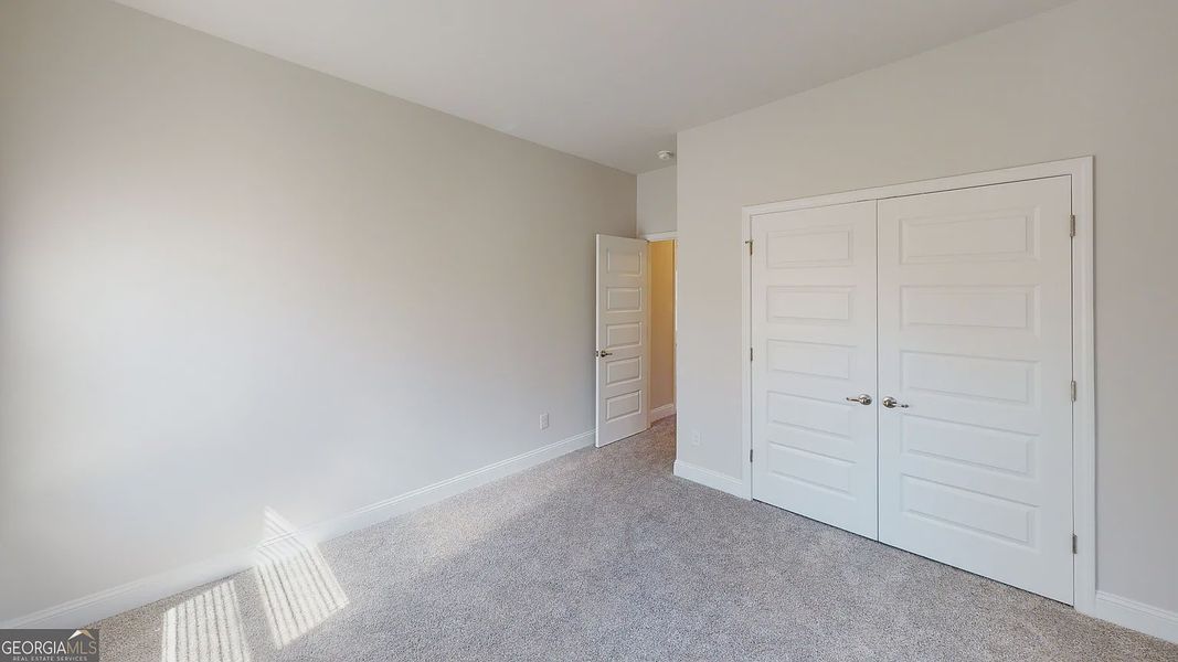 Spacious, unfurnished interior of a new home in Holliday Pass, Griffin (Image 20).