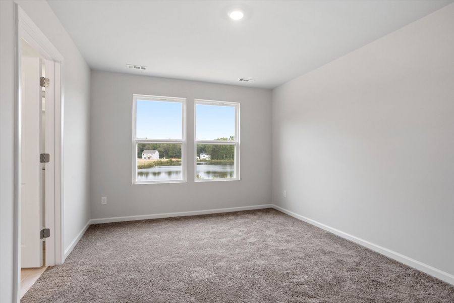 Spacious, unfurnished interior of a new home in Cambridge Reserve, Angier (Image 22).