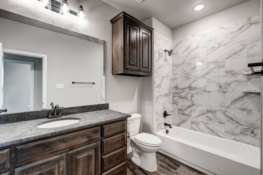 Representative furnished interior of a home built from the The Jackson by Doug Parr Custom Homes in Monarch Manor, Poolville (Image 11).