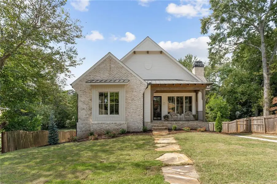 Front exterior of a new home in , Marietta, GA, highlighting curb appeal (Image 1).