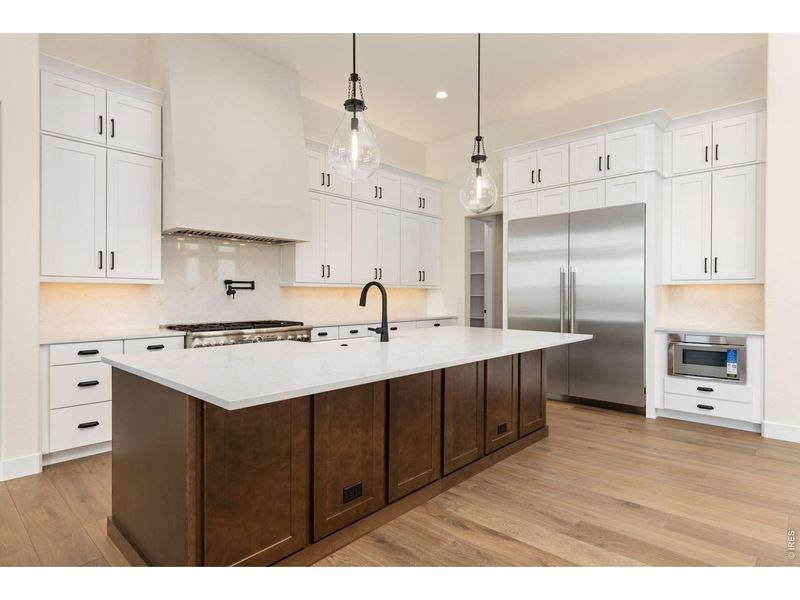 Furnished interior view inside a new home in RainDance, Windsor (Image 15).