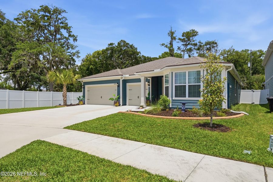 Front exterior of a new home in , Jacksonville, FL, highlighting curb appeal (Image 26).
