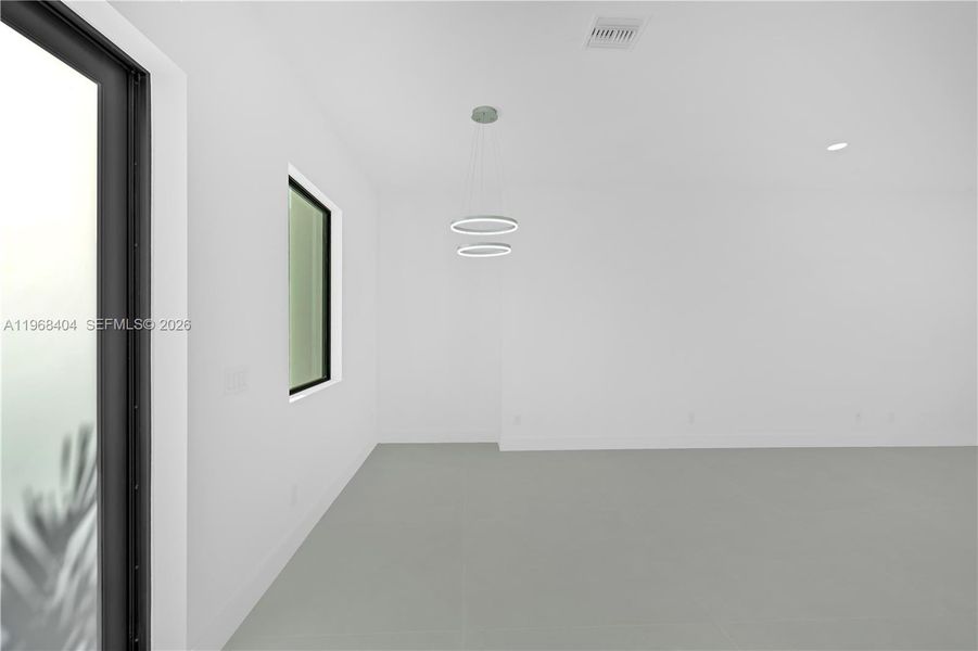 Spacious, unfurnished interior of a new home in , Port Charlotte (Image 40).