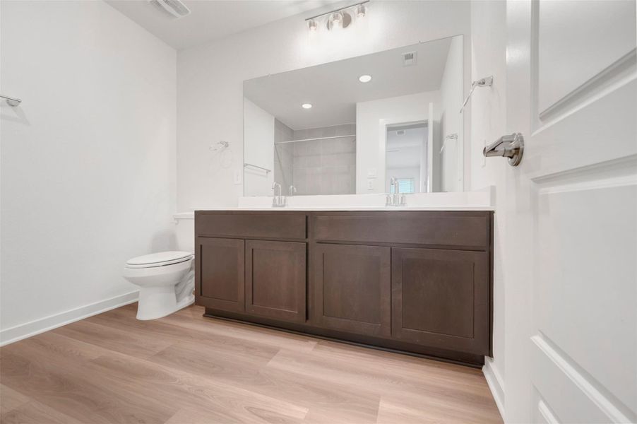 Furnished interior view inside a new home in Lone Star Landing, Montgomery (Image 10).